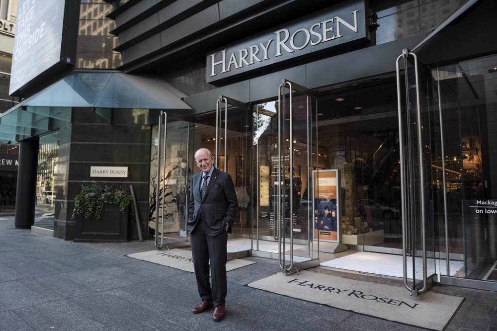 The founder of Canadian men's clothing retailer Harry Rosen Inc. has died at 92. Canadian menswear titan Harry Rosen poses for a portrait in front of his Bloor Street store in Toronto, Wednesday, Oct. 19, 2016. THE CANADIAN PRESS/Christopher Katsarov