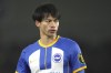 FILE - Brighton's Kaoru Mitoma looks onduring the Premier League soccer match between Brighton and Hove Albion and Crystal Palace at the American Express Community Stadium in Brighton, England, Wednesday, March 15, 2023. Japan forward Kaoru Mitoma is a major doubt for next month's Asian Cup after sustaining an ankle injury with his English Premier League club Brighton. (AP Photo/Kin Cheung, File)