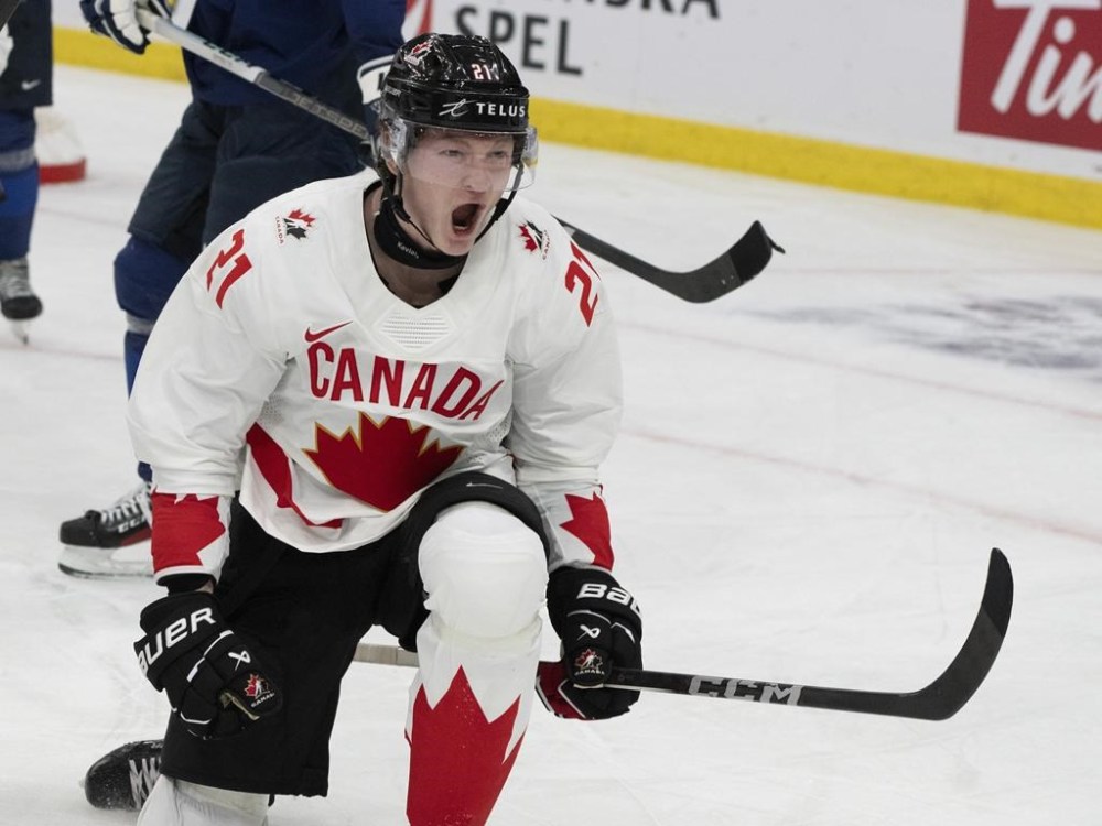 For the second year in a row, Team Canada is celebrating its goals at the world junior ice hockey championship with a song from Newfoundland. Canada's Owen Allard (21) celebrates his goal against Finland during second period hockey action at the IIHF World Junior Hockey Championship in Gothenburg, Sweden on Tuesday, Dec. 26, 2023. THE CANADIAN PRESS/Christinne Muschi