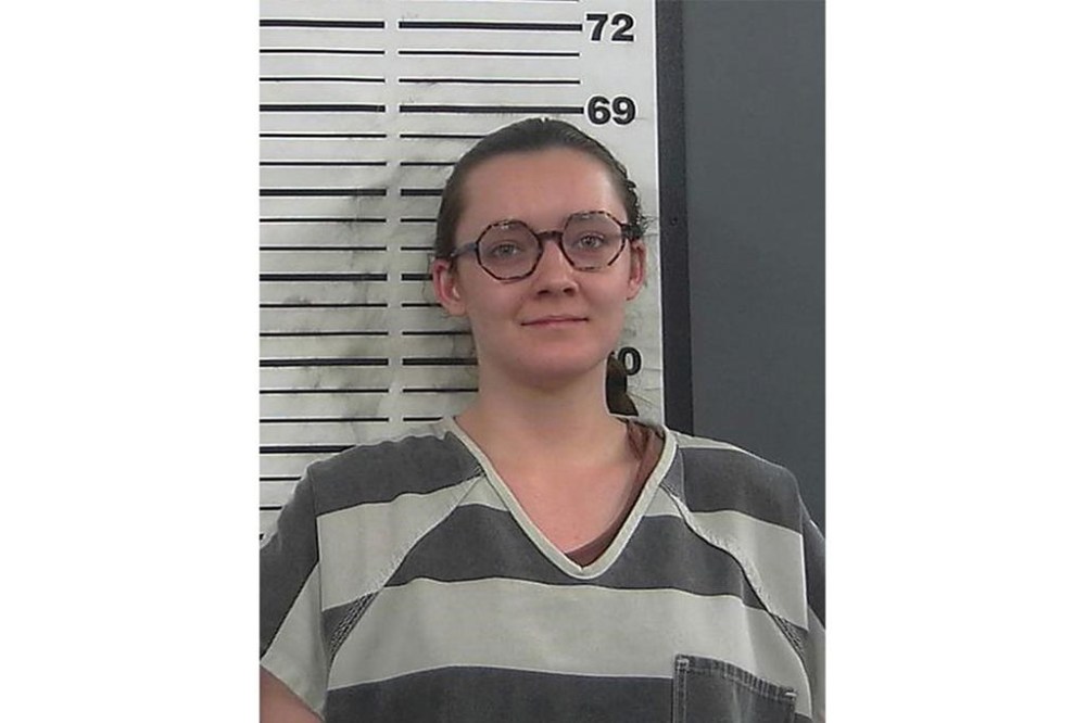 FILE - This booking photo provided by the Platte County, Wyo., Sheriff's Office shows Lorna Roxanne Green, March 23, 2023, in Wheatland, Wyo. On Tuesday, Dec. 26, a judge ordered Green, who set fire to Wyoming's only full-service abortion clinic, to pay nearly $300,000 in restitution, the full amount sought by prosecutors. (Platte County Sheriff's Office via AP, File)
