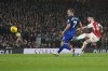 Arsenal's Ben White, right, takes a shot on goal during the English Premier League soccer match between Arsenal and West Ham at Emirates stadium in London, England, Thursday, Dec. 28, 2023. (AP Photo/Alastair Grant)