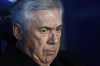 Real Madrid's head coach Carlo Ancelotti waits for the start of the Spanish La Liga soccer match between Alaves and Real Madrid at the Mendizorroza stadium in Vitoria-Gasteiz, Spain, Thursday, Dec. 21, 2023. (AP Photo/Ricardo Larreina)