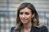 FILE - Donald Trump's lawyer, Alina Habba, speaks to the media outside the New York City courthouse where the former president was testifying on Nov. 6, 2023, in a lawsuit accusing him of fraudulently inflating his net worth in financial statements to lenders and others. (AP Photo/Ted Shaffrey, File)