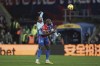 Brentford's Ethan Pinnock, left, and Crystal Palace's Jean-Philippe Mateta battle for the ball during the English Premier League soccer match between Brentford FC and Crystal Palace at Selhurst Park in London, Saturday, Dec. 30, 2023. (Adam Davy/PA via AP)