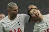 Tottenham's Son Heung-min, right, celebrates with Tottenham's Richarlison after scoring his side's second goal during the English Premier League soccer match between Tottenham Hotspur and AFC Bournemouth at the Tottenham Hotspur Stadium in London, Sunday, Dec. 31, 2023. (AP Photo/Ian Walton)