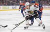 Chicago Blackhawks' Connor Bedard (98) pulls away from Edmonton Oilers' Evan Bouchard (2) during first period NHL action in Edmonton on Tuesday, Dec. 12, 2023. Bedard has been named the NHL's rookie of the month for December. THE CANADIAN PRESS/Jason Franson