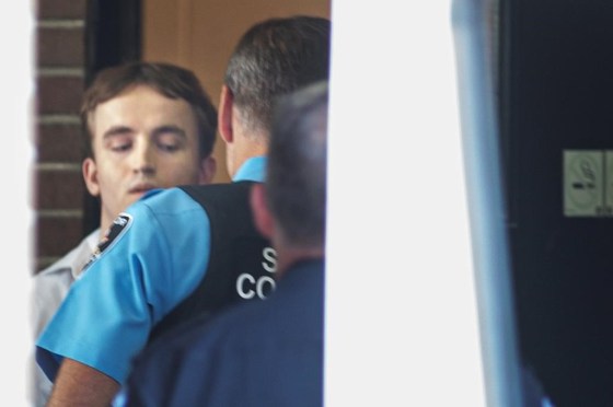 Nathaniel Veltman is escorted leaving trial in September. (Dax Melmer / The Canadian Press files)
