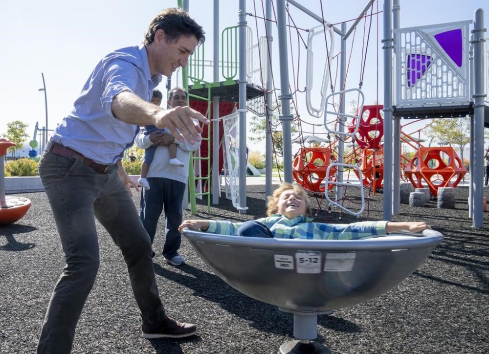 Prime Minister Justin Trudeau plays with his son Hadrien during a visit to Brampton, Ontario on Friday September 29, 2023. THE CANADIAN PRESS/Frank Gunn