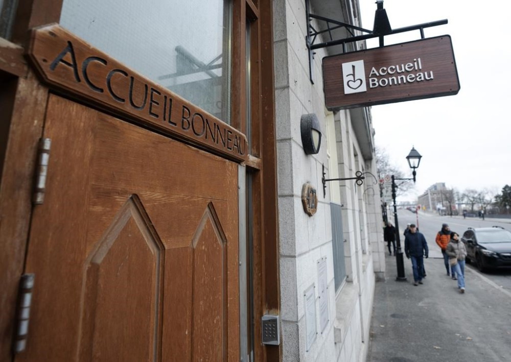 An Old Montreal organization serving people without homes says it will be able to continue offering hot meals seven days a week until the end of March after receiving emergency government aid. The Accueil Bonneau shelter is seen Tuesday, Jan. 2, 2024, in Montreal. THE CANADIAN PRESS/Ryan Remiorz