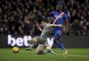 Everton's Seamus Coleman, left and Crystal Palace's Jean-Philippe Mateta vie for the ball , during the English FA Cup third round soccer match between Crystal Palace and Everton at Selhurst Park, London, Thursday, Jan. 4, 2024. (Adam Davy/PA via AP)
