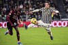 Salernitana's Junior Sambia, left, and Juventus' Fabio Miretti battle for the ball during the Italian Cup soccer match between Juventus and Salernitana at the Juventus Stadium in Turin, Italy, Thursday, Jan. 4, 2024. (Marco Alpozzi/dpa via AP)
