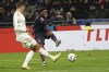 Lille's Jonathan David, right, and Lille's Gabriel Gudmundsson challenge for the ball during the French League One soccer match between Lyon and Lille at the Groupama stadium, outside Lyon, France, Sunday, Nov. 26, 2023. THE CANADIAN PRESS/AP-Laurent Cipriani