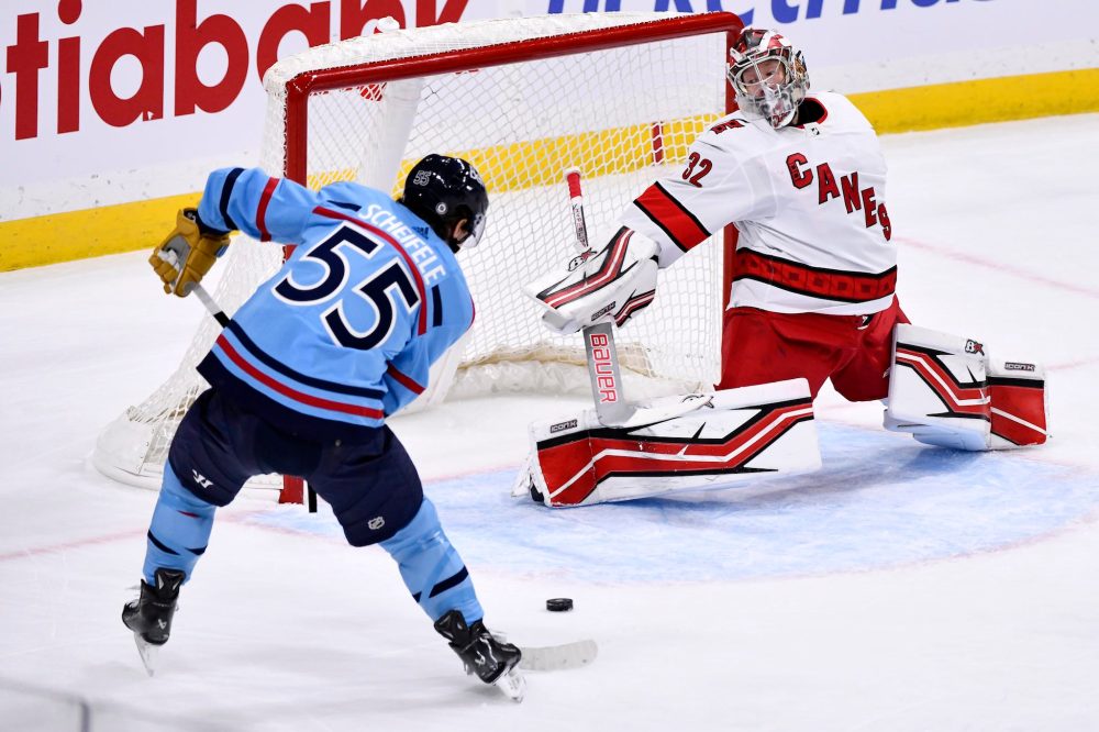 Fred Greenslade / THE CANADIAN PRESS
Mark Scheifele fires a shot on Hurricanes goaltender Antti Raanta during the first period.