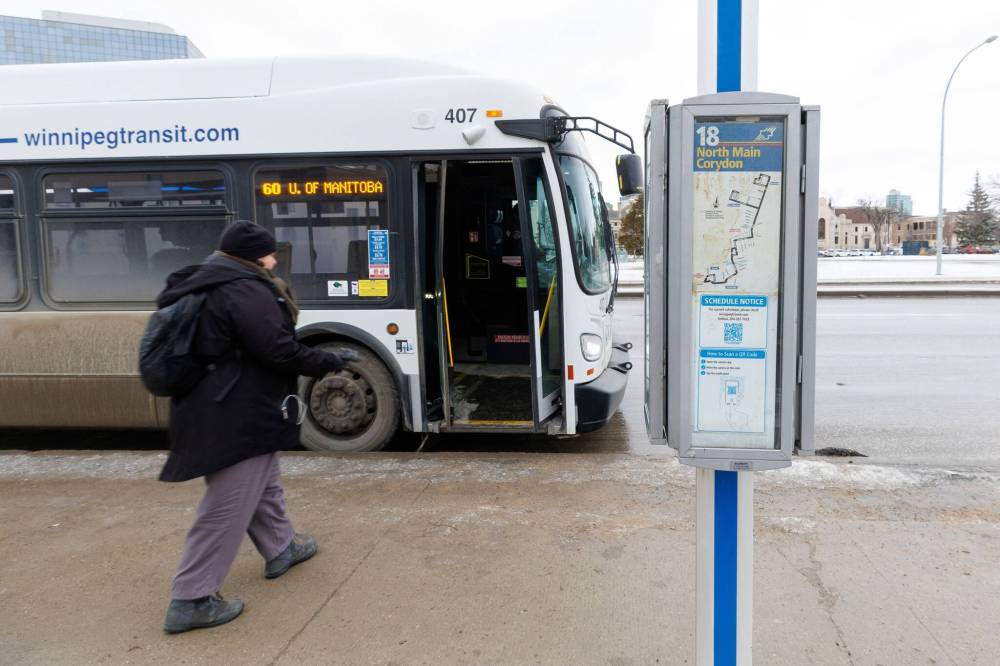 MIKE DEAL / WINNIPEG FREE PRESS
                                The Southbound Osborne at York bus stop Tuesday afternoon. The city has apparently removed schedules from some bus stops and is posting QR codes instead. Some argue that hurts those who don’t have phones or data.