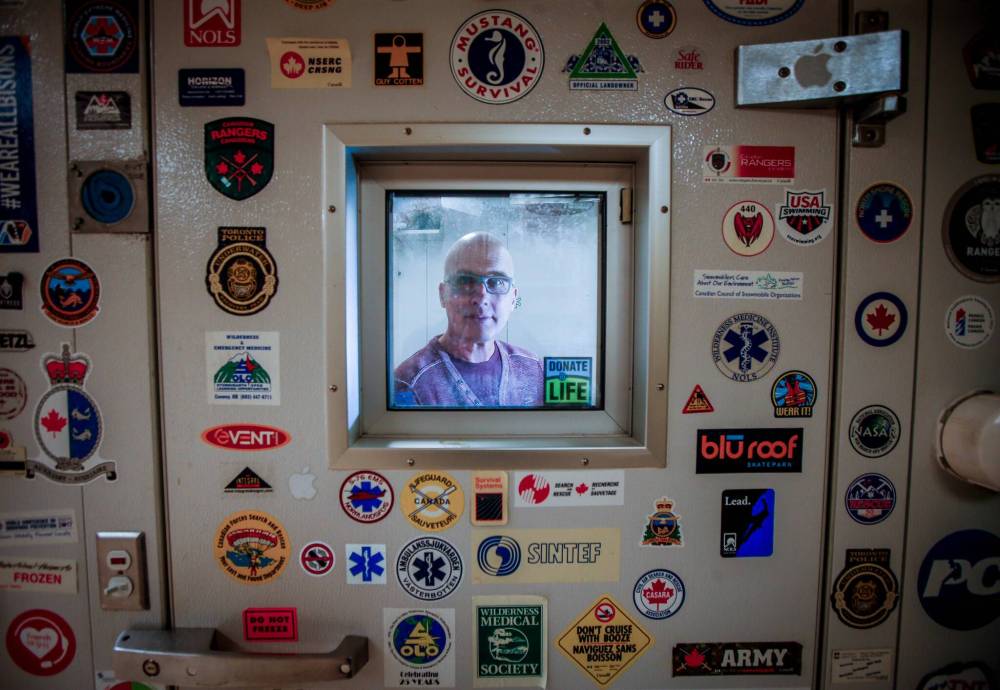 Thermophysiologist Gordon Giesbrecht (a.k.a. Professor Popsicle) sits in the freezer unit in his office/research lab at the University of Manitoba in December. (John Woods / Winnipeg Free Press files)