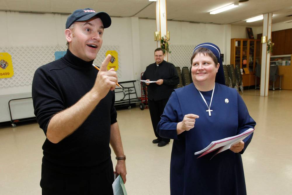 TREVOR HAGAN / WINNIPEG FREE PRESS files
- Director/Composer, Danny Schur, gives instructions to Sister Janet Kozak as Father Mark Gnutel looks on. 10-09-27
