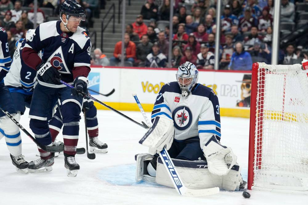 David Zalubowski / The Associated Press files
Winnipeg Jets goaltender Connor Hellebuyck has been on a roll since a slow start to the season.
