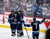 Fred Greenslade / THE CANADIAN PRESS
                                Winnipeg Jets’ Cole Perfetti celebrates his goal against the Columbus Blue Jackets with teammates during the second period in Winnipeg on Tuesday.