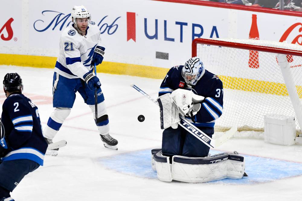 Fred Greenslade / THE CANADIAN PRESS files
Jets goaltender Connor Hellebuyck (above) and backup Laurent Brossoit have combined to lead the NHL in goals against average.