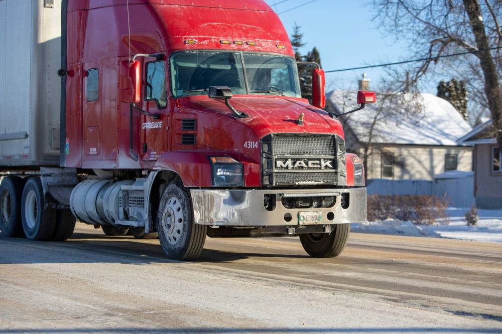 BROOK JONES / WINNIPEG FREE PRESS
A semi-trailer truck travels westbound down McGillivray Boulevard. The most common offense among commercial drivers in Manitoba last year was for failing to install and properly mount an ELD, with 193 tickets being issued. An additional 66 drivers were fined for falsifying their hours of service.