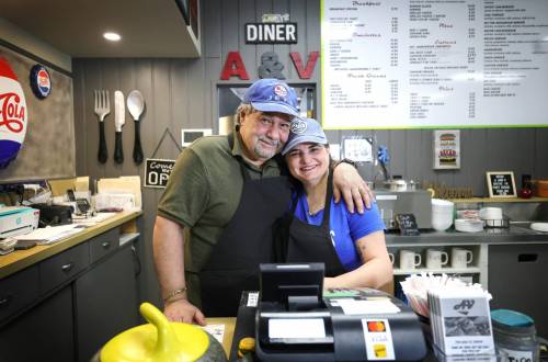 RUTH BONNEVILLE / WINNIPEG FREE PRESS
After running their A and V Drive-In on Chevrier Boulevard since 2004, Vicky Cavadas and husband Angelo relocated last fall to Fort Rouge Curling Club, where their business has been booming.