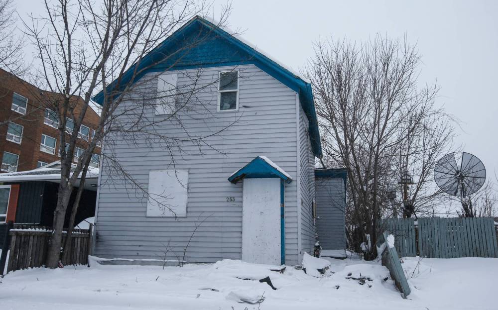 The owner of a vacant building at 253 Chambers St. is being sued for more than $20K. (John Woods / Winnipeg Free Press)