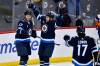 THE CANADIAN PRESS/Fred Greenslade
                                Winnipeg Jets’ Gabriel Vilardi celebrates a goal against the New York Islanders with teammates Dylan Demelo and Adam Lowry during the first period Tuesday.