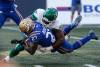 John Woods / The Canadian Press files
                                Saskatchewan’s Charbel Dabire tackles the Bombers’ Johnny Augustine at IG Field. The turf that is being replaced had been in use for 10 years.