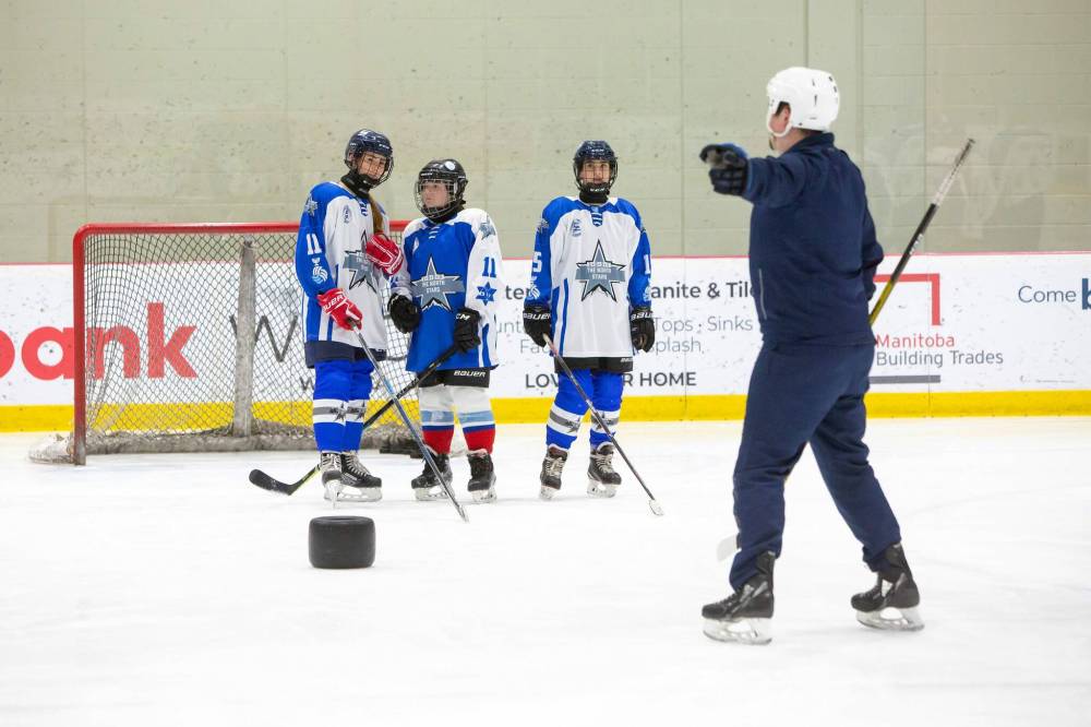 “This is what they love, this is their life,” said Ariela Segal, the team manager. “They don’t care about school, they don’t care about nothing. Just give them ice all the time, this is what they want.” (Brook Jones / Winnipeg Free Press)