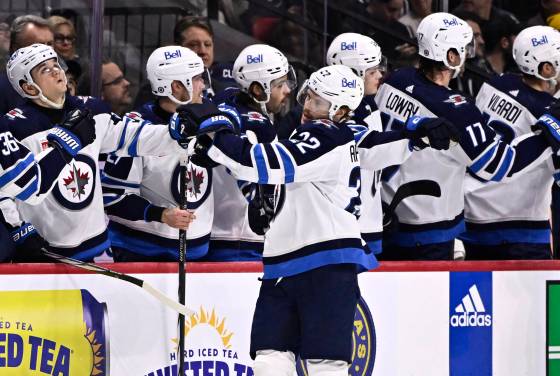 JUSTIN TANG / THE CANADIAN PRESS FILES Mason Appleton (centre) anticipates the Jets hot streak will keep rolling into playoff season.