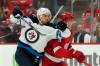 Carlos Osorio / The Associated Press files
                                Nino Niederreiter (left) has made the adjustment to being on the Jets third line this season and could still net 20 goals.
