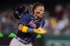 FILE - Atlanta Braves' Ronald Acuña Jr. runs to third base on a double by Ozzie Albies during the fifth inning of the team's baseball game against the Washington Nationals, Sept. 22, 2023, in Washington. Shohei Ohtani and Acuña won the 2023 Hank Aaron Awards on Saturday, Dec. 16, presented by Major League Baseball to the most outstanding offensive performer in each league. The MLB award is picked by fan balloting combined with votes from a panel of Hall of Famers and former winners. (AP Photo/Andrew Harnik, File)