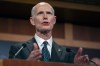 FILE - Sen. Rick Scott, R-Fla., speaks at a press conference on appropriations with members of the House Freedom Caucus and conservative senators on Capitol Hill, Wednesday, Nov. 29, 2023 in Washington. A spate of false reports of shootings at the homes of public officials in recent days could be setting the stage for stricter penalties against so-called swatting in more states. Scott, Boston Mayor Michelle Wu, Georgia U.S. Rep. Marjorie Taylor Greene and Ohio Attorney General Dave Yost have been among the victims.(AP Photo/Mark Schiefelbein, File)