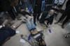 Palestinians wounded in the Israeli bombardment of the Gaza Strip are brought to Al Aqsa hospital in Deir al Balah, Gaza Strip, Sunday, Jan. 7, 2024. (AP Photo/Adel Hana)