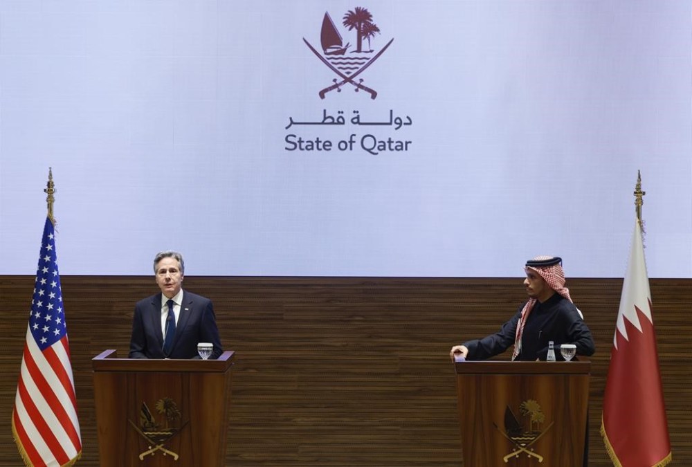 U.S. Secretary of State Antony Blinken, left, and Qatar's Prime Minister and Foreign Minister Sheikh Mohammed bin Abdulrahman Al Thani attend a press conference, during Blinken's week-long trip aimed at calming tensions across the Middle East, in Doha, Qatar, Sunday, Jan. 7, 2024. (Evelyn Hockstein/Pool via AP)