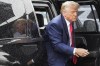 FILE - Former President Donald Trump arrives to board his plane at Ronald Reagan Washington National Airport, Aug. 3, 2023. Trump is set to return for the first time in months to the federal courthouse in Washington as an appeals court hears arguments on whether the former president is immune from prosecution on charges that he plotted to overturn the results of the 2020 election.(AP Photo/Alex Brandon)