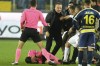 FILE - Referee Halil Umut Meler holds his face as he lies on the ground after being punched by MKE Ankaragucu president Faruk Koca, center, at the end of the Turkish Super Lig soccer match between MKE Ankaragucu and Caykur Rizespor in Ankara, Dec. 11, 2023. Koca, the former president of a Turkish top division soccer team told a court on Tuesday Jan. 9, 2024, that he regretted attacking a referee at the end of a league game but denied having threatened him with death. (Abdurrahman Antakyali/Depo Photos via AP, File)