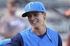 FILE - Tampa Tarpons manager Rachel Balkovec watches from the dugout, while making her debut as a minor league manager of the Tarpons, a Class A affiliate of the New York Yankees, April 8, 2022, in Lakeland, Fla. The Miami Marlins are in agreement with Yankees minor league manager Rachel Balkovec to become their director of player development, according to a person familiar with the deal. The person confirmed an MLB.com report of Balkovec’s hiring to The Associated Press on Tuesday, Jan. 8, 2024, on condition of anonymity because the team had not announced the deal. (AP Photo/Phelan M. Ebenhack, File)