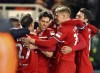Middlesbrough's Hayden Hackney, centre, celebrates with teammates after scoring his side's first goal of the game , during the English League Cup semi final first leg soccer match between Middlesbrough and Chelsea, at the Riverside Stadium, in Middlesbrough, England, Tuesday, Jan. 9, 2024. (Martin Rickett/PA via AP)