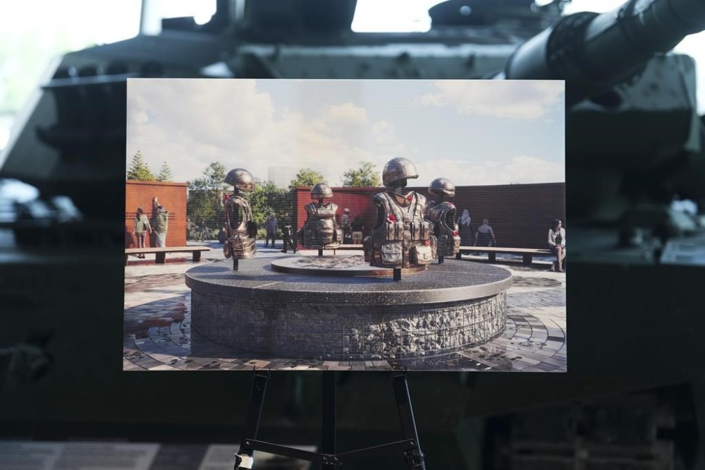 The federal government won't say why it abandoned a plan to consult with veterans about whether the Taliban takeover in 2021 changed their opinion of a proposed monument to Canada's mission in Afghanistan. An artist rendering of the new national monument to Canada's mission in Afghanistan is pictured during an announcement at the Canadian War Museum in Ottawa on Monday, June 19, 2023. THE CANADIAN PRESS/Sean Kilpatrick