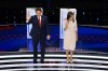 Former UN Ambassador Nikki Haley, right, and Florida Gov. Ron DeSantis, left, waving to members of the audience at the start of the CNN Republican presidential debate at Drake University in Des Moines, Iowa, Wednesday, Jan. 10, 2024. (AP Photo/Andrew Harnik)