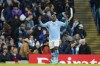 Manchester City's Jeremy Doku celebrates after scoring his side's fifth goal during the English FA Cup third round soccer match between Manchester City and Huddersfield Town, at the Etihad stadium in Manchester, England, Sunday, Jan. 7, 2024. (AP Photo/Dave Thompson)