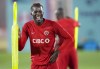 Canada forward Ike Ugbo laughs during practice at the World Cup in Doha, Qatar, Friday, Nov. 25, 2022. THE CANADIAN PRESS/Nathan Denette