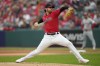FILE - Cleveland Guardians' Shane Bieber pitches to a Cincinnati Reds batter during the first inning of a baseball game Wednesday, Sept. 27, 2023, in Cleveland. Bieber and the Guardians have avoided salary arbitration by agreeing to a $13.125 million contract for next season, a person familiar with the negotiations told The Associated Press on Thursday, Jan. 11, 2024. Teams and players have until 8 p.m. to exchange salary figures for 2024.(AP Photo/Sue Ogrocki, File)