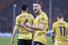 Genoa's Radu Dragusin celebrates after scoring their side's first goal of the game during the Serie A soccer match between Genoa and Inter at the Luigi Ferraris stadium in Genoa, Italy, Friday Dec. 29, 2023. (Tano Pecoraro/LaPresse via AP)