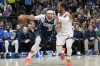 Dallas Mavericks guard Seth Curry (30) dribbles against New York Knicks guard Jalen Brunson (11) during the first half of an NBA basketball game in Dallas, Thursday, Jan. 11, 2024. (AP Photo/LM Otero)
