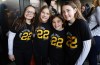 Caitlin Clark fans Layla Lehansky, Leah Railski, Emma Lawrence and Alexa Lehansky, of West Milford, N.J., pose for photos while waiting in line to enter the arena for an NCAA college basketball game between Iowa and Rutgers Friday, Jan. 5, 2024, in Piscataway, N.J. (AP Photo/Noah K. Murray)