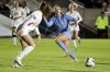 FILE - North Carolina's Ally Sentnor (21) passes the ball during the first half of the team's NCAA College Cup semifinal soccer match against Florida State in Cary, N.C., Dec. 2, 2022. Two players from North Carolina, Sentnor and Savy King, were selected with the top two picks in the National Women's Soccer League draft Friday night, Jan. 12, 2024. Sentnor, the ACC Midfielder of the Year, went with the No. 1 pick overall to the expansion Utah Royals. As a sophomore last year she had 11 goals and seven assists. (AP Photo/Karl B DeBlaker)