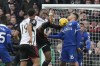 Fulham's Issa Diop, centre, challenges for the ball with Chelsea's Levi Colwill, right, during the English Premier League soccer match between Chelsea and Fulham at Stamford Bridge stadium in London, Saturday, Jan. 13, 2024. (AP Photo/Frank Augstein)