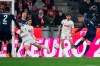 Heidenheim's Adrian Beck, right, scores a goal, during the Bundesliga soccer match between FC Cologne and 1. FC Heidenheim at RheinEnergieStadion in Cologne, Germany, Saturday Jan. 13, 2024. (Marius Becker/dpa via AP)
